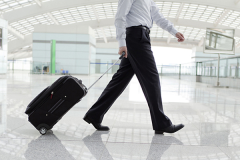 What is US Airways’ checked baggage policy for travelers flying to India?